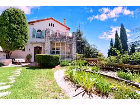 maison caractere -quartier residentiel tres calme- proximite centre ville a pied