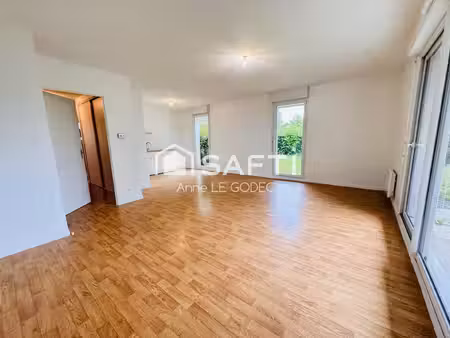 t3 spacieux en rez-de-jardin avec garage et parking