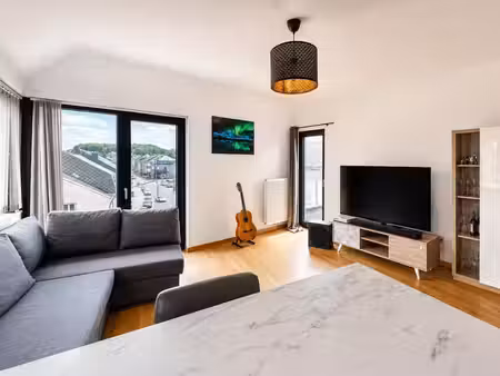 superbe appartement à halanzy : parking couvert  cave & ter