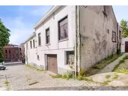 opportunité unique au cœur d'overijse : commerce + logement