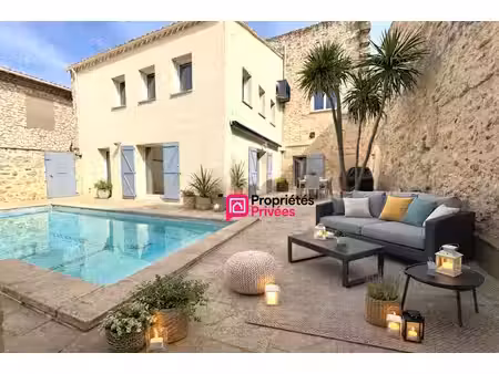 a vendre mas en pierre de 340 m2 avec piscine situé à mauguio et à 10 min de la plage