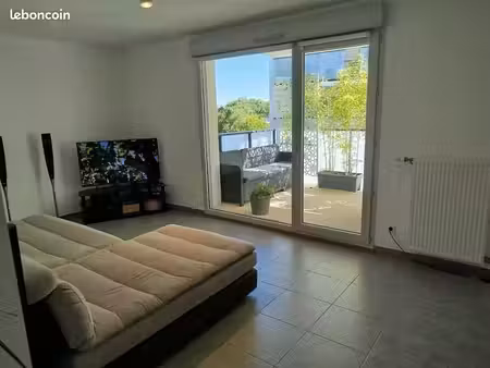 t3 62 m² avec balcon et double garage - proche gare ter