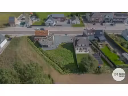 opwijk - commerciële ontwikkelingsgrond met handelspand