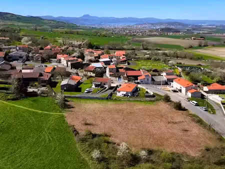 vente terrain à batir 604 m² à saint-julien-de-coppel (63160)  63 000 €
