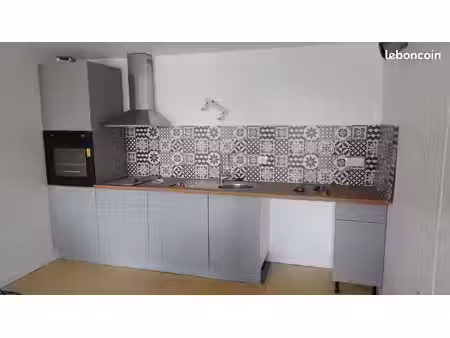 f2 rénové au centre de st laurent d'olt