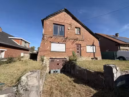 maison à parachever sur +/- 10 ares avec vaste jardin et gar