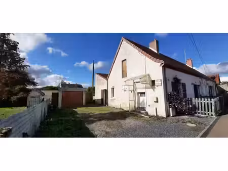 maison mitoyenne plain pied avec potentiel d'aménagement
