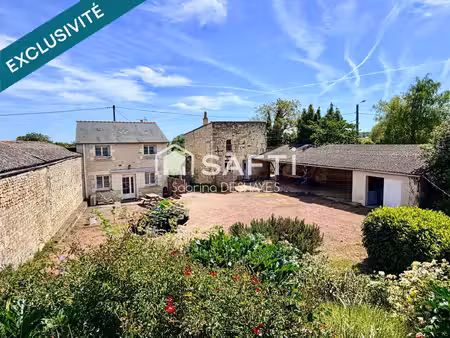 ensemble immobilier composé de 2 maisons  cave  garage et jardin clos