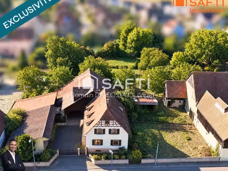 superbe ensemble immobilier composé d'une grande maison d'habitation  de 2 hangars et d'un