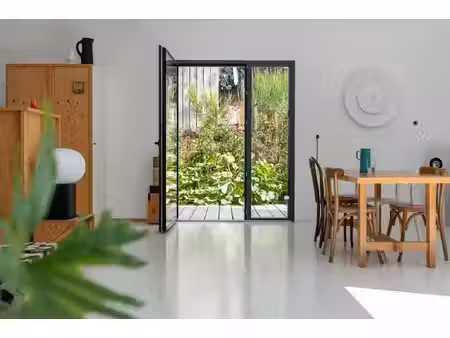 maison d'architecte bioclimatique en ossature bois et ses ateliers créatifs
