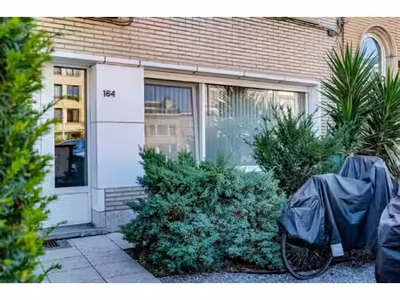 prachtig gelijkvloers appartement met 1 slaapkamer  zonnige tuin en polyvalente ruimte!