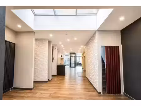 la louvière – maison de commerce avec habitation  jardin et
