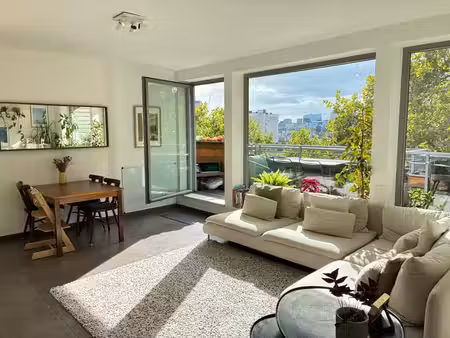 penthouse lumineux de 2 chambres avec terrasse sud-ouest