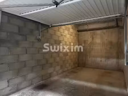 garage sécurisé en sous-sol de 13 m² !