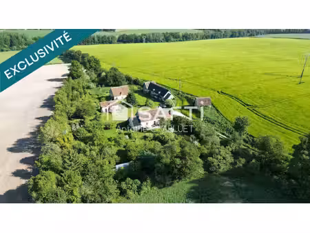 ancienne ferme de 130m² avec terrain arboré de 9 330 m²  nombreuses dépendances et potenti
