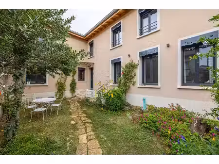 maison rénovée par architecte à proximité des gratte ciel