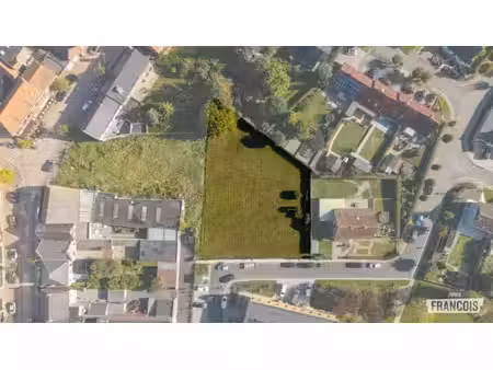 perceel van 624m² bouwgrond voor halfopen bebouwing in cent…