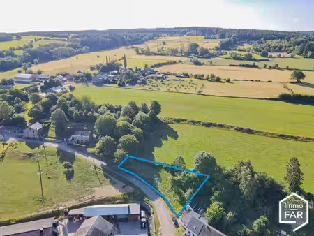 à 9 minutes de marche- parcelle à bâtir de 9a 16ca au calme