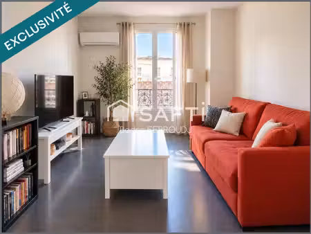 t3 traversant 39 m² – immeuble de caractère – quartier des antiquaires