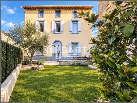 maison atypique de 170 m² avec 3 cours  grenier aménageable et stationnement privatif