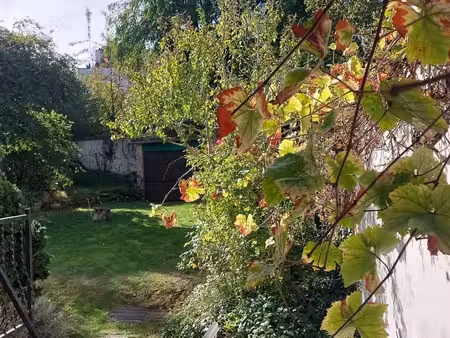 elégant rez duplex 150 m² peb c+ jardin plein sud