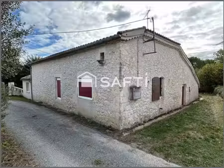 maison en pierre en coeur de village + dépendances