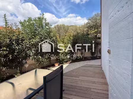 joli t2 dans un petit immeuble plein de charme  jardin et stationnement