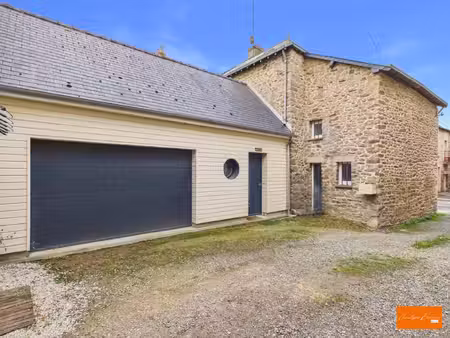maison rénovée avec jardin et garage à commer