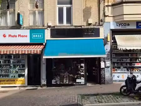 maison mixte commerce + logement