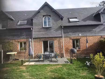 maison jumelée avec jardin  débarras et parking