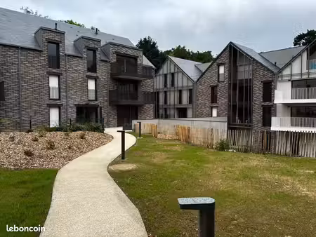 t2 neuf meublé avec jardin privatif et parking en sous-sol à dinard