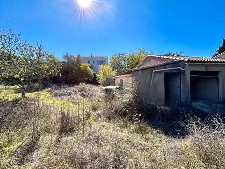 terrain viabilisé 523 m2 avec garage existant
