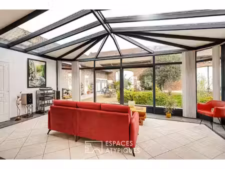 aile de ferme de caractère et son jardin intérieur