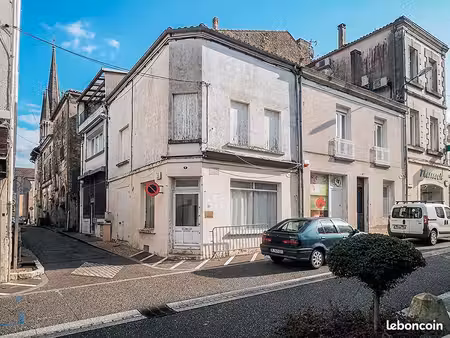 immeuble à usage mixte bureaux-commerces / habitation