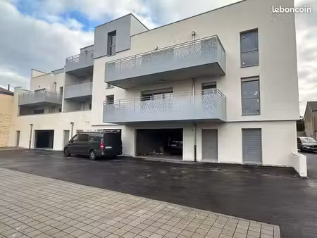 f2 neuf avec cuisine équipée et place parking proche gare 5mn