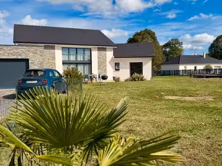 maison de 215m² avec double garage - terrain de 2100m²