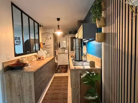 appartement traversant t4 avec balcon et garage