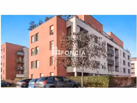 pfastatt – appartement 2 pièces de 53 m² avec balcon et parking privatif