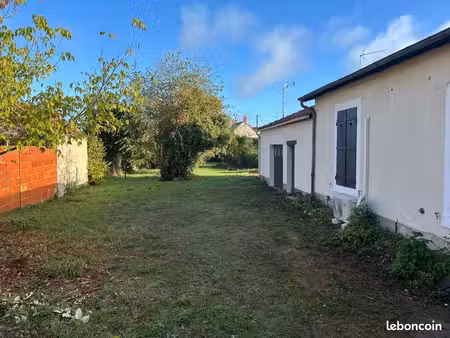 f2 avec garage et jardin