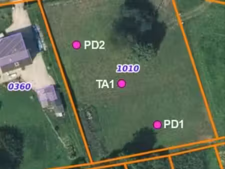 vends terrain à bâtir