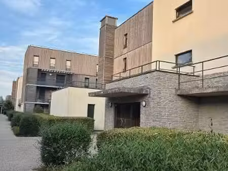 f2 en rez de jardin avec place de parking