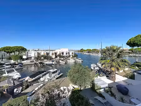 port camargue - le charme authentqiue d'une marina 4 pieces en triplex d'environ 100 m² av