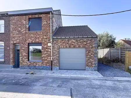 habitation 3 façades avec garage et passage latéral
