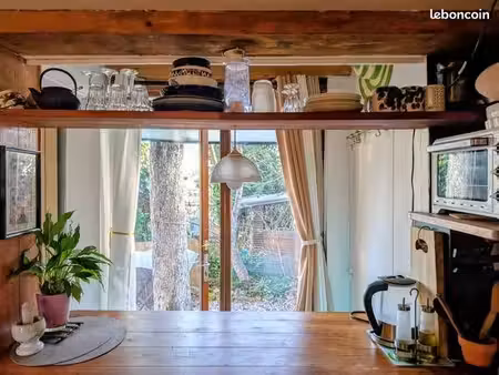10 min de montparnasse  petite maison dans grand jardin