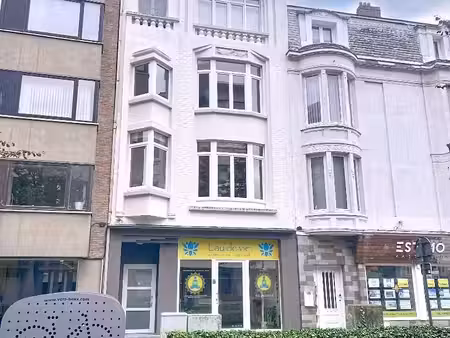 uitstekend gelegen handelspand met authentieke gevel – groentemarkt.