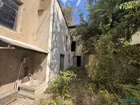 plateau à rénover de 140m2 en plein centre de montmerle sur sa
