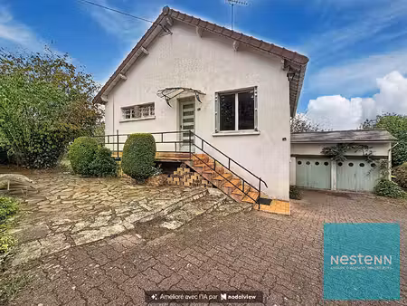 maison surélevée sur un sous-sol total édifiée sur un terrain de 1200 m² environ à vendre 