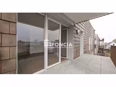 bel appartement 3 pièces de 60 m² avec balcon de 10 m² et garage en sous-sol