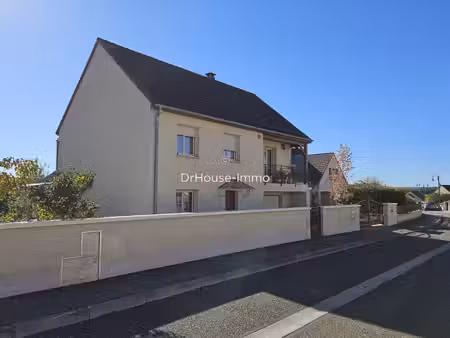 maison familiale de 150m² avec 4 chambres  jardin paysager  véranda garage et dépendances 