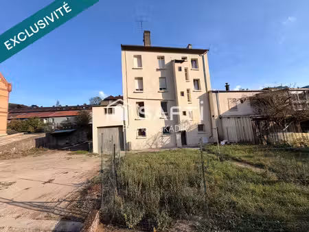 immeuble de rapport – 4 appartements  local commercial  2 garages et terrain constructible